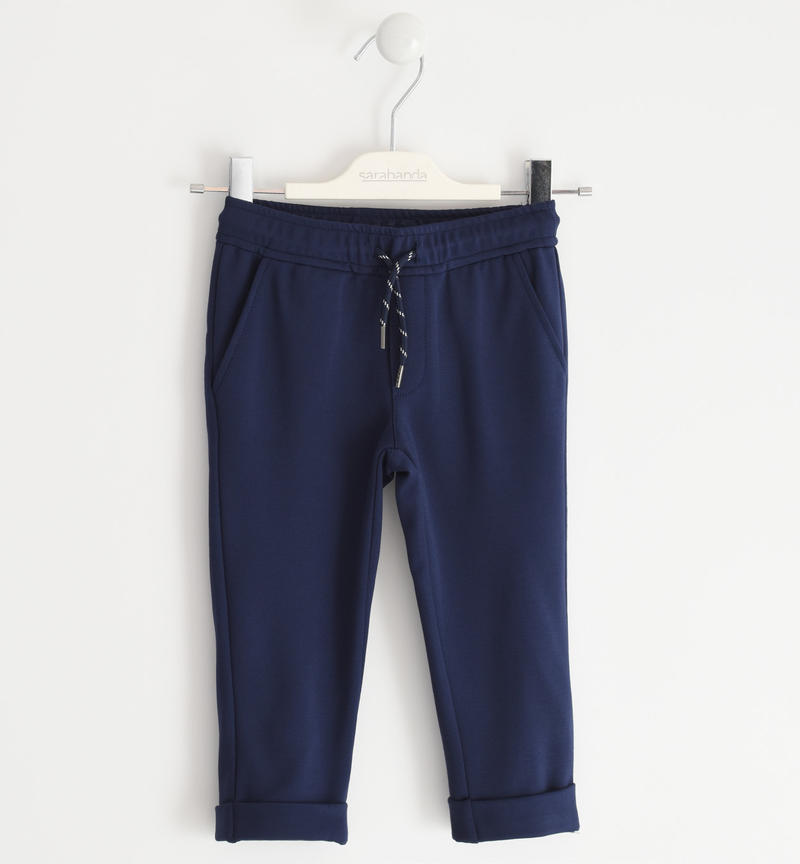 Detail of long trousers in Milano stitch for baby boy from 6 months to 7 years Sarabanda NAVY-3854